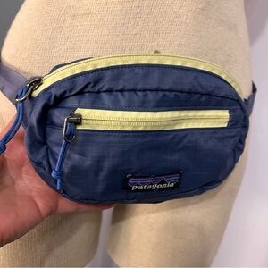 Patagonia Ultralight Black Hole Mini 1L in adjustable multicolor purple yellow